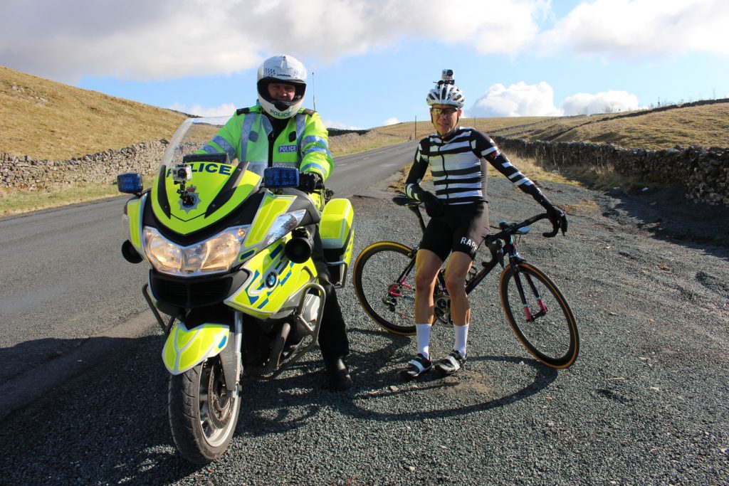 Jamie Sharp with his police escort on a beautiful North Yorkshire day